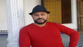 الأديب المغربي نزار كربوط