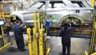 مصانع فورد تعود للحياة بـ"سوار إلكتروني"