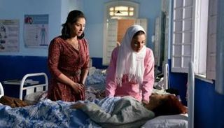 درة وحنان مطاوع في مشهد من فيلم "يوم وليلة"