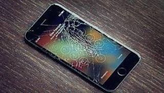 هاتف شاشته مكسورة- أرشيفية