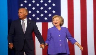 هيلاري كلينتون وجو بايدن - أ ف ب