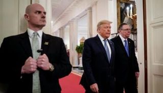 أحد عملاء الخدمة السرية خلال مهمة حماية الرئيس الأمريكي