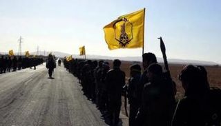 مسلحون من مليشيا فاطميون الإيرانية- أرشيفية
