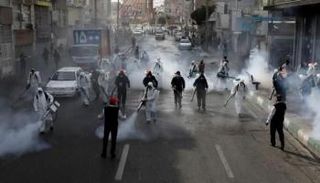 رجال الإطفاء يعقمون شوارع طهران - بيزنس إنسايدر