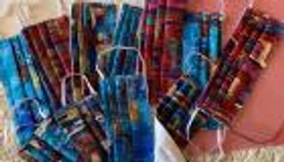 تشكيلية مصرية تواجه كورونا بـ"لوحات فنية" على الكمامات