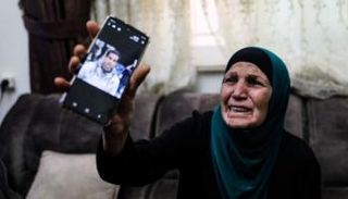 والدة الشهيد الفلسطيني إياد الحلاق