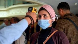 قياس درجة حرارة المواطنين في الأماكن العامة بمصر
