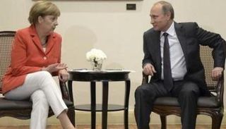 فلاديمير بوتين وأنجيلا ميركل في لقاء سابق