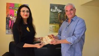 المنتج ممدوح سبع والروائية ريم بسيوني