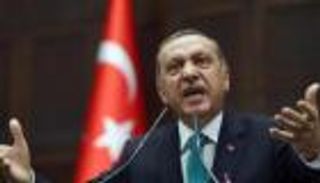 "صورة أردوغان" تمنع مشجعين من حضور مباراة