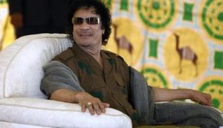 الرئيس الليبي الراحل معمر القذافي