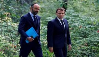 الرئيس إيمانويل ماكرون ورئيس الوزراء السابق إدوار فيليب - أرشيفية