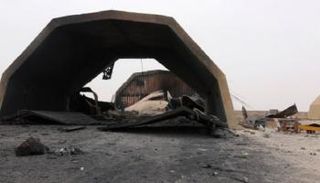 صورة متداولة لآثار القصف على قاعدة الوطية الجوية