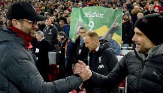 كلوب مدرب ليفربول وجوارديولا مدرب مانشستر سيتي