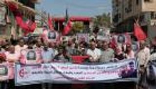 تظاهرة بغزة تطالب بحملة دولية لإنهاء معاناة أسير مريض