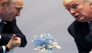 لقاء سابق بين ترامب وبوتين- أرشيفية