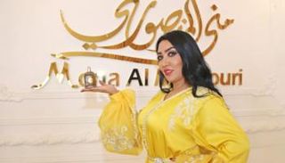 من تصاميم مجموعة العيد للمصممة منى المنصوري