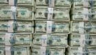 العراق يكشف حقيقة تداول الدولار الليبي في البلاد