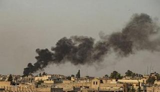 الدخان يتصاعد من مناطق بالمدينة جراء القصف التركي