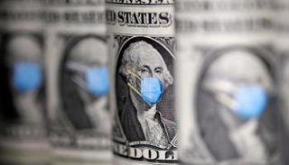 عملات من الدولار الأمريكي - رويترز