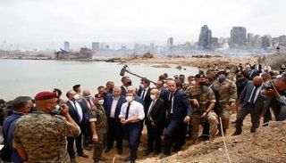 الرئيس الفرنسي إيمانويل ماكرون خلال زيارته لمرفأ بيروت - أ.ف.ب