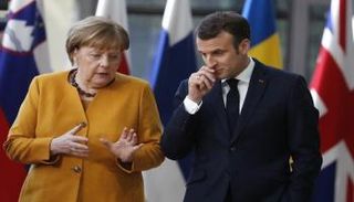 الرئيس الفرنسي إيمانويل ماكرون والمستشارة الألمانية أنجيلا ميركل- أرشيفية