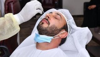 فحص كورونا في الإمارات