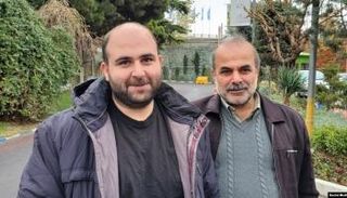 محمد مساعد إلى جوار والده - أرشيفية