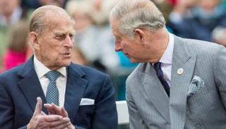 الأمير فيليب دوق إدنبرة ونجله الأكبر الأمير تشارلز أمير ويلز