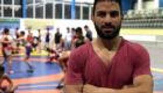 لعنة إعدام المصارع "أفكاري" تطارد إيران دوليا