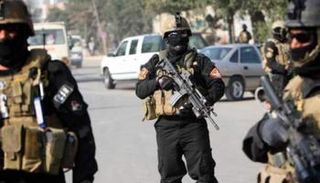 عناصر من الشرطة العراقية في مهمة أمنية ببغداد - إرشيفية