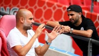 رياض محرز نجم مانشستر سيتي ومدربه جوارديولا