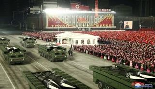 جانب من العرض العسكري - رويترز 