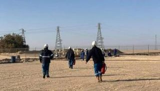 عمال شركة الواحة للنفط في ليبيا - أرشيفية