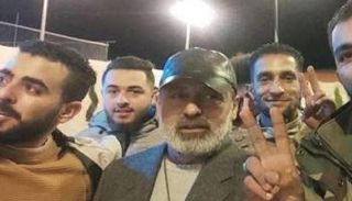 الككلي يتوسط عناصر من المليشيات المسلحة- أرشيفية