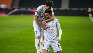 رامي بن سبعيني يحتفل بهدفه أمام دورتموند
