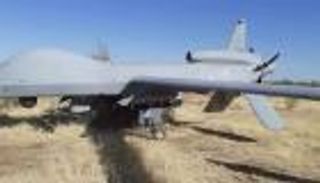 بالصور.. درونز أمريكية تهبط اضطراريا بعد مهمة استطلاع بليبيا