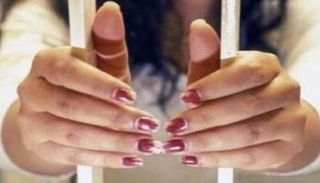 امرأة داخل سجن - صورة أرشيفية