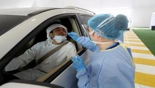فحص كورونا من المركبة في الإمارات