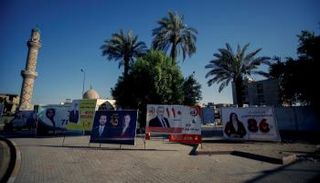 لوحات دعائية لمرشحين في انتخابات العراق- رويترز