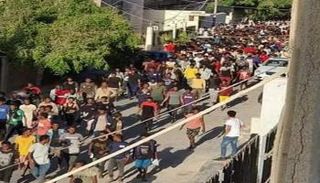  فرار المهاجرين من مركز الاحتجاز في طرابلس. (أرشيفية)