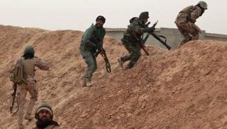 عناصر من مليشيات تقودها إيران في سوريا