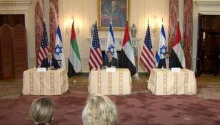 جانب من اللقاء في واشنطنجانب من الاجتماع الثلاثي في واشنطن