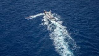 جانب من عملية اعتراض مهاجرين قبالة ليبيا - أرشيفية