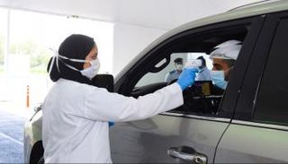 فحص كورونا من المركبة في الإمارات