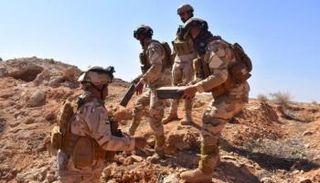 عناصر من الجيش العراقي تضبط عبوات ناسفة (أرشيفية)