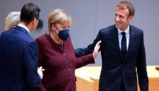 ميركل خلال حضورها للقمة الأوروبية في بروكسل- أ.ف.ب