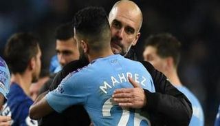 بيب جوارديولا مع رياض محرز