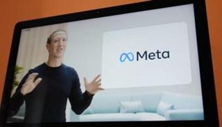 شعار اسم فيسبوك الجديد Meta خلف مارك زوكربيرج
