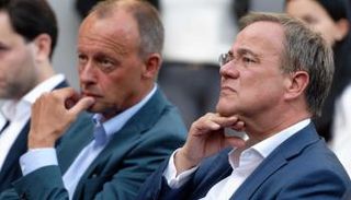 رئيس الحزب أرمين لاشيت وميرتس